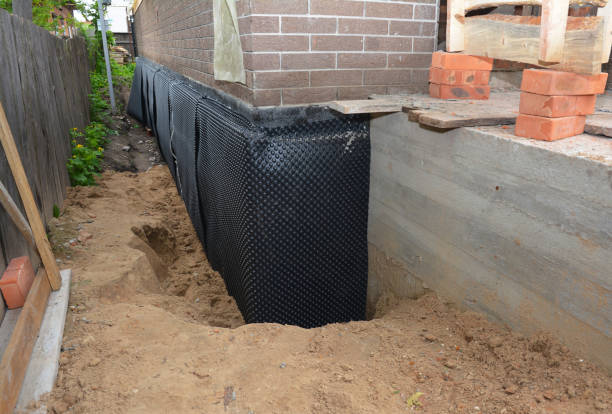 Happy homeowners after waterproofing job in Hamden